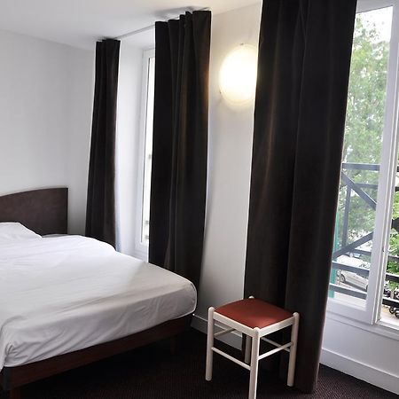 Hotel De La Tour Parigi Camera foto