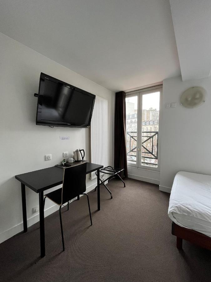 Hotel De La Tour Parigi Esterno foto